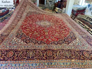 Persian rug Kashan, Size: 412x303 cm, floral design, hand knotted by natural wool & vegetable dye, R18 000 valuation certificate.
